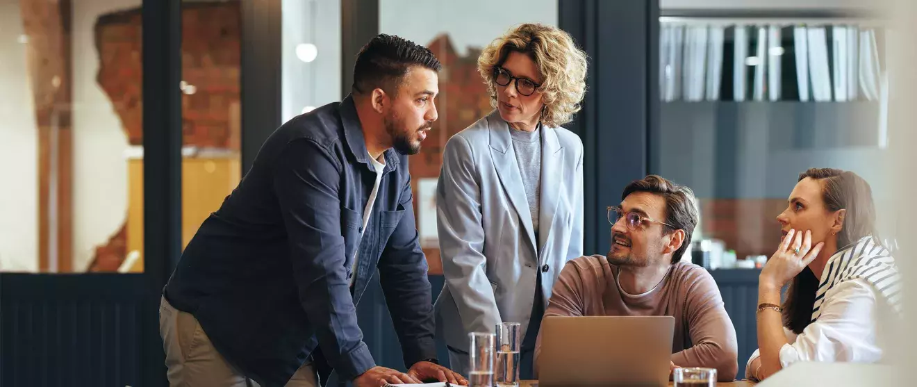 Group of office workers collaborating